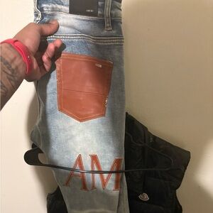 AMIRI Light Blue Jeans with Brown Accent